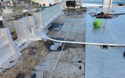 Carrying out Torch on waterproofing repairs to flat roof deck